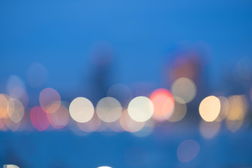 Blurred abstract background of office building at sea harbour at evening time,urban life.