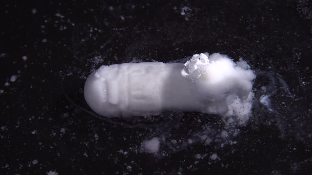 Pill Dissolve In Water. Macro Video