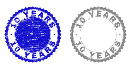 10 YEARS stamp seals with grunge texture in blue and grey colors isolated on white background. Vector rubber overlay of 10 YEARS label inside round rosette. Stamp seals with retro textures.