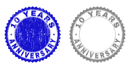 10 YEARS ANNIVERSARY stamp seals with grunge texture in blue and gray colors isolated on white background. Vector rubber imprint of 10 YEARS ANNIVERSARY text inside round rosette.