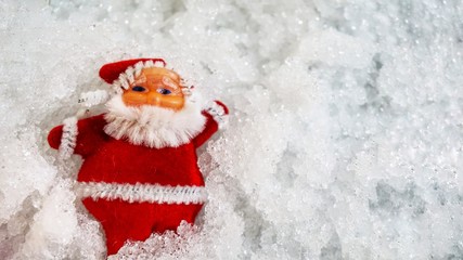 Santa Claus on snow.