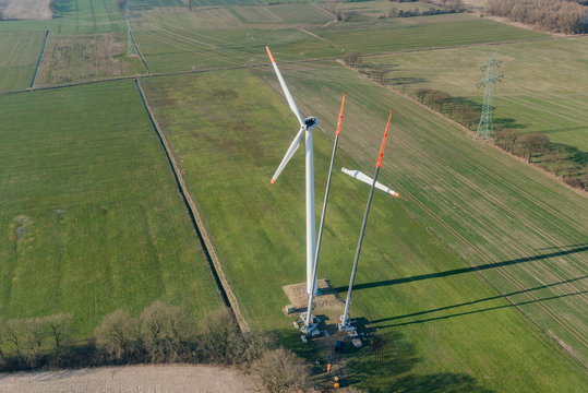 Aerial shot of replacement of a rotor blade on a wind turbine
