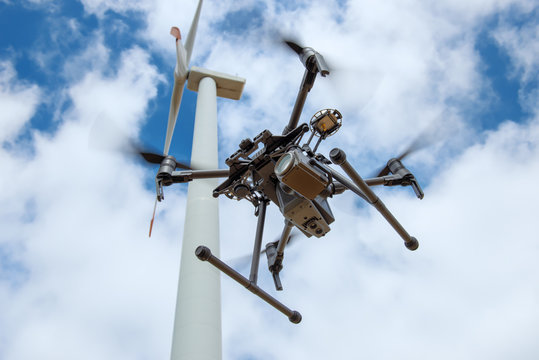 Industrial drone for inspection of rotor blades on wind turbines