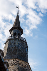 Obraz premium Low angle view of old tower in Dinan against sky