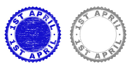 1ST APRIL stamp seals with distress texture in blue and gray colors isolated on white background. Vector rubber imitation of 1ST APRIL text inside round rosette. Stamp seals with dirty textures.