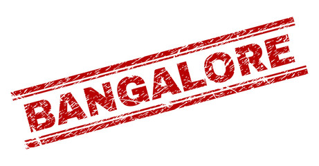 BANGALORE seal print with distress texture. Red vector rubber print of BANGALORE caption with dust texture. Text title is placed between double parallel lines.