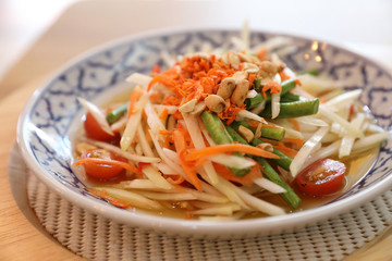Green papaya salad or Som tam in Thai street food
