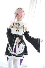 Portrait of Japan anime cosplay woman , white japanese maid in white tone room