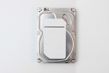 Hard disk with white label for text. 