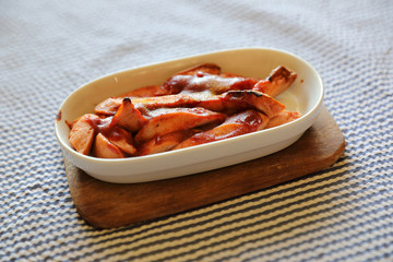 Sausage with curry sauce , Currywurst german food