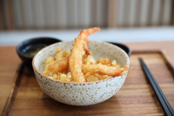 Tempura donburi , Fried shrimp tempura on rice japanese food on wooden table