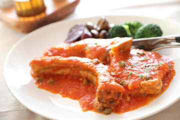 Pork chop steak with tomato sauce and mushroom , Italian food