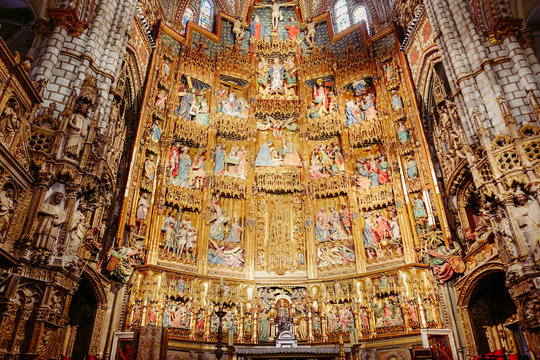 Masterpiece ancient artwork of the golden Gothic style retable of The Primate Cathedral of Saint Mary. Toledo, spain.