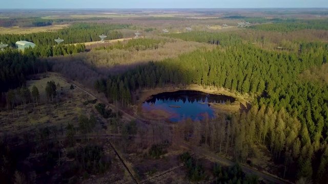 Drone Shot of The Westerbork Synthesis Radio Telescope (WSRT). An aperture synthesis interferometer consisting of a linear array of 14 antennas. Timelapse