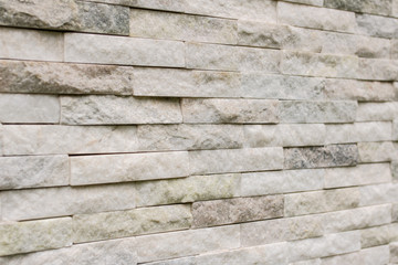 pared o muro de piedra blanca clara con textura tipo marmol en perspectiva