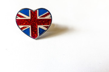 Union flag known as union Jack on heart shaped broach.