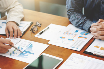 two start up people meeting discussion in value of product data in cafe.