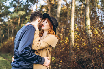 Happy young romantic couple spend time together outdoor.