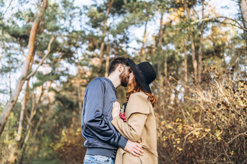 Happy young romantic couple spend time together outdoor.