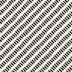 Simple geometric vector pattern. Monochrome black and white slanted brush strokes background. Hand draw diagonal dash lines.