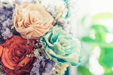 Selective focus of beautiful colorful flowers with summer bokeh background.vintage color style.