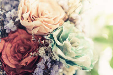 Selective focus of beautiful colorful flowers with summer bokeh background.vintage color style.