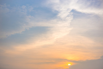 Naklejka na ściany i meble Clouds and sky scene with bright light at sunset