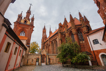 Naklejka na ściany i meble VILNIUS / LITHUANIA - OCTOBER 09, 2012: gothic CHurch of St. Anne, roman catholic church in Vilnius old town, UNESCO world heritage
