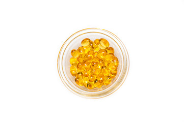 Plate of cod liver oil and fish oil , top view. The concept of health care and longevity.