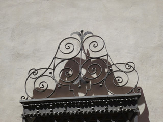decoration of cast iron metal above a front door in Alicante