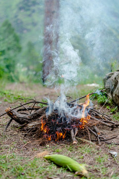 Photo of Grilling Corn on Bonfire in Himalayas