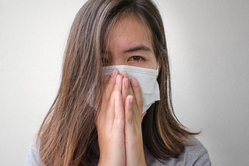 Asian women was influenza. she was coughing and wear hygienic mask.