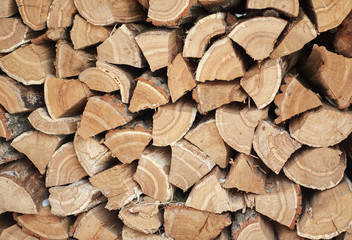 Firewood for the oven is accurately laid for storage.