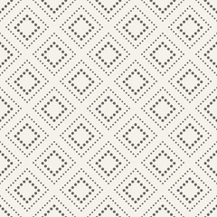 Abstract seamless pattern of dotted rhombuses.