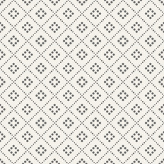 Abstract seamless pattern of dotted rhombuses.