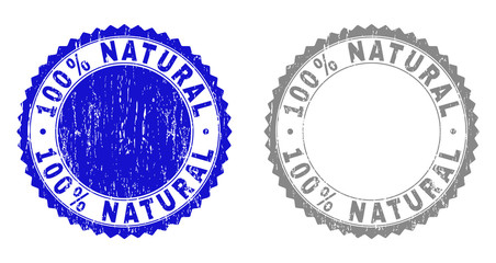 100% NATURAL stamp seals with grunge texture in blue and gray colors isolated on white background. Vector rubber watermark of 100% NATURAL label inside round rosette. Stamp seals with retro styles.
