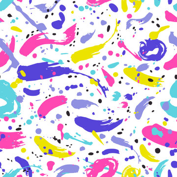 Artistic seamless pattern with vibrant paint stains, marks, traces, drops on white background
