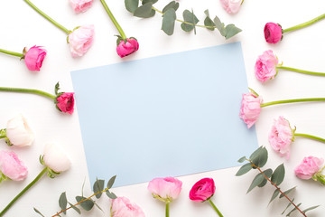 Beautiful colored ranunculus flowers on a white background.Spring greeting card.