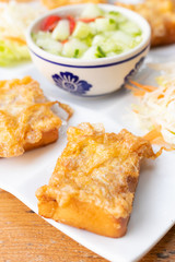 Fried bread with minced pork spread omelette and cucumber in sweet sauce, Thai food