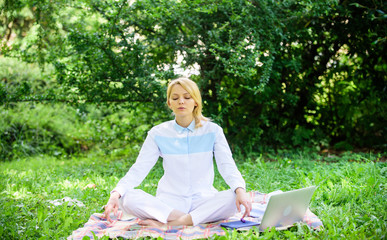 Woman relaxing practicing meditation. Reasons you should meditate every day. Find minute to relax....