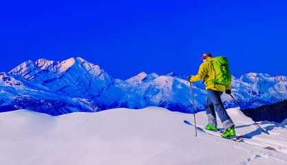 Skiing with amazing view of swiss famous mountains in beautiful winter snow  Mt Fort. The matterhorn and the Dent d'Herens. In the foreground the Grand Desert glacier.