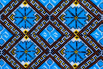 Close-up beautiful Ukrainian traditional style embroidery. Vyshivanka.