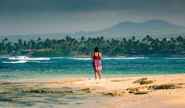 Woman standing on beach, Maui, Hawaii, Untied States