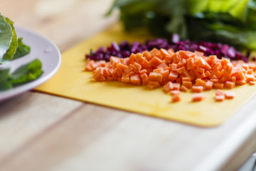 Cut vegetables on the yellow cutting board