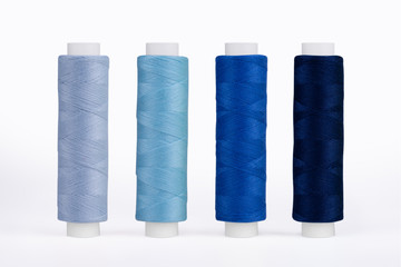 Set of sewing thread coils, miscellaneous colours, isolated on white