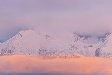 Naklejka na ściany i meble Peaks of High Tatras at dawn, beautiful outdoor winter background