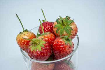 Red strawberry fruit for fresh food or a food ingredient can see at many markets or supermarket in Thailand 