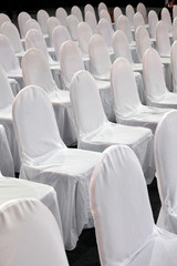 Rows of white chairs