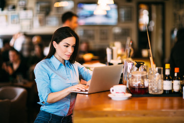 Business woman using laptop