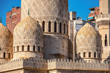 .18/11/2018 Alexandria, Egypt, Incredibly beautiful mosque Abo El Abass against blue sky and palm...